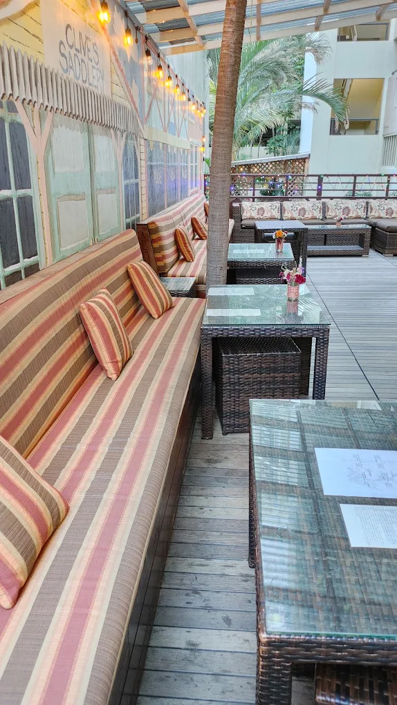 Clive's Saddlery patio lounge at The Equus Hotel